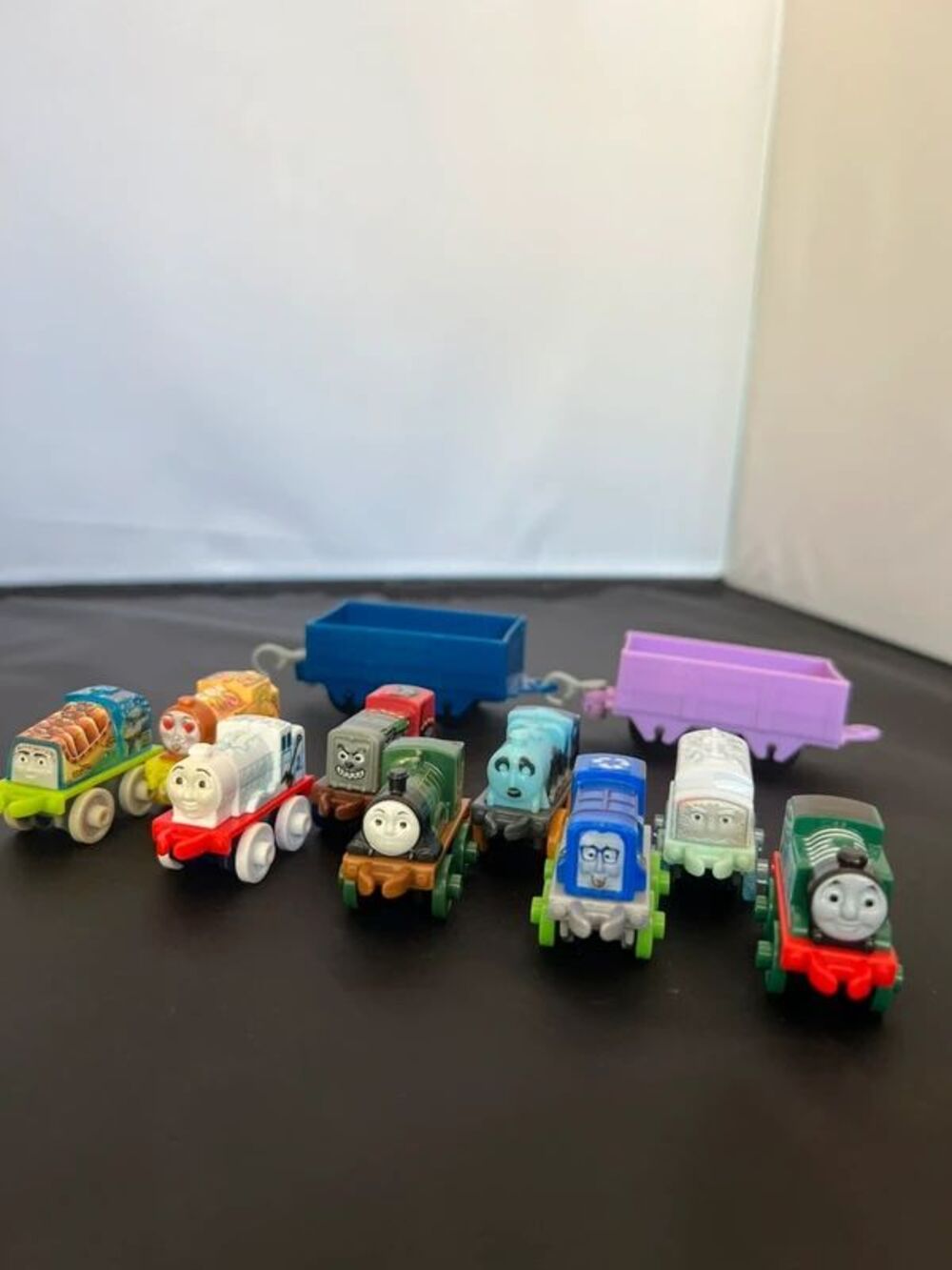 (9) Thomas The Train Minis and (2) Rolling Carts